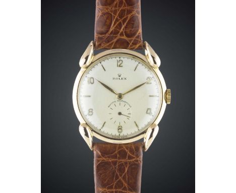 A GENTLEMAN'S 18K SOLID PINK GOLD ROLEX WRIST WATCHCIRCA 1950s, REF. 6240 WITH "HORN" LUGS Movement: 15J, manual wind, signed