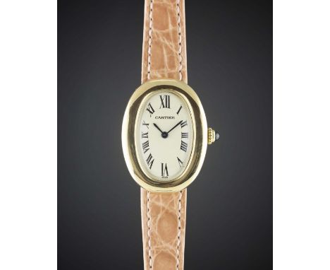 A LADIES 18K SOLID GOLD CARTIER BAIGNOIRE WRIST WATCHCIRCA 1990s, REF. 8057910Movement: Quartz, signed Cartier.Case: Approx. 