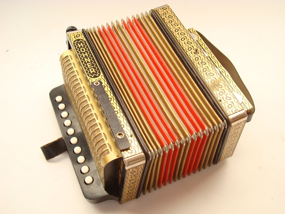Hohner 1 row 4 stop diatonic accordion / melodeon, in gilt decorated