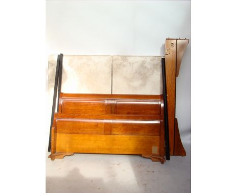 A French cherry wood sleigh bed. 