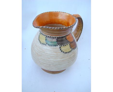 Charlotte Rhead Crown Ducal, a stitch and patch orange pattern jug, shape 192, printed marks. 