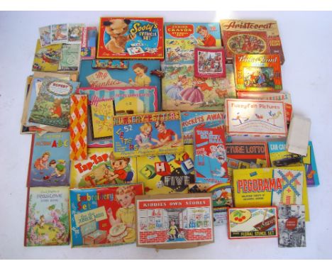 A large collection of 1950's games puzzles etc to include Kiddies own Stores Airfix Rockets Away Bagatelle etc (2 boxes). 