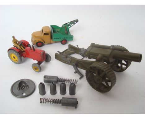 A Britains mobile 18" heavy howitzer with shells, slight damage. Together with a Dinky Commer service truck 25x with red ridg