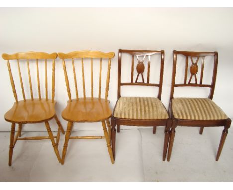 A pair of beech stick back kitchen chairs together with a pair of reproduction mahogany dining chairs with drop in seats (4).