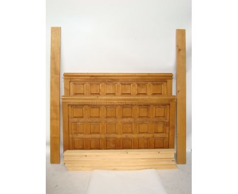 A modern panelled pine double bed frame.  