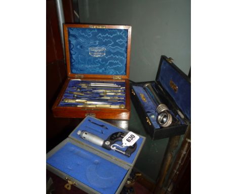 A CASED SWISS TESA MICROMETER, 0-1', together with a cased Ultra Lens illuminated scope and a cased set of Stanley draughtsma