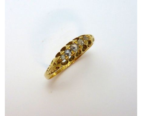 AN 18CT GOLD DIAMOND RING, with graduated rose cut diamonds to the tapered shank, hallmarks for Chester 1897, ring size M 1/2