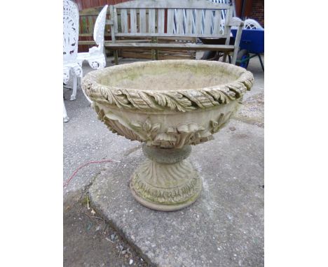 A COMPOSITE GARDEN PLANTER, on a separate stand