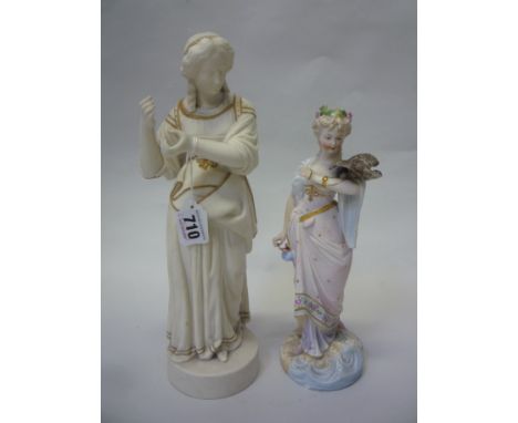 A PARIAN FIGURINE, gilt decoration with a bisque figurine with bird (2)