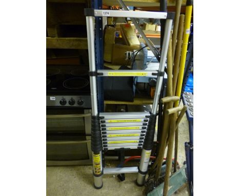 A TELESCOPIC EXTENSION LADDER