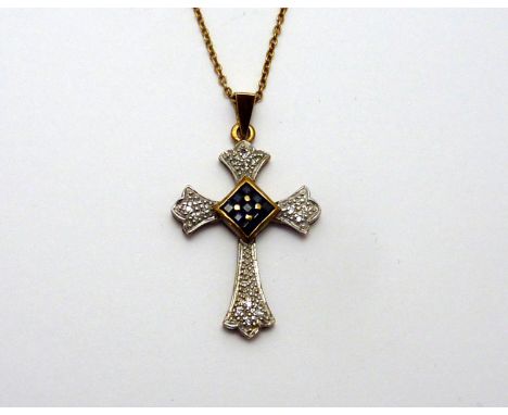 A 9CT GOLD DIAMOND AND SAPPHIRE CRUCIFIX PENDANT, with sapphire square shape centre and diamond accents, hallmarks for London