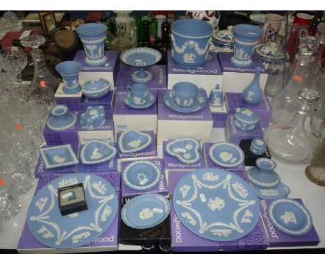 WEDGWOOD BLUE JASPERWARE TRINKETS, CUPS, SAUCERS, VASES, etc (mostly boxed) (over 20 pieces)