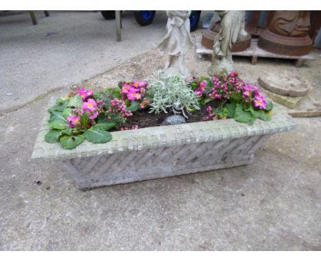 A COMPOSITE RECTANGULAR GARDEN PLANTER