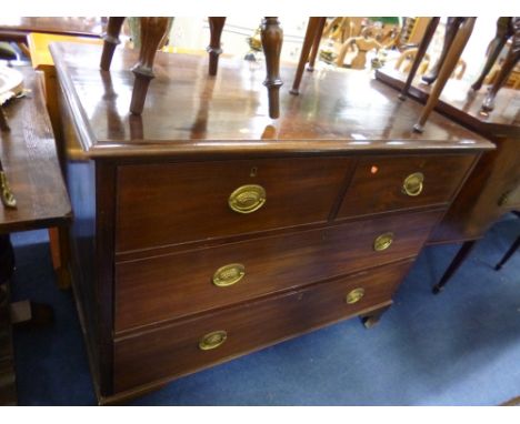 A 19TH CENTURY MAHOGANY CHEST, of two short and two long drawers, with ogee bracket feet