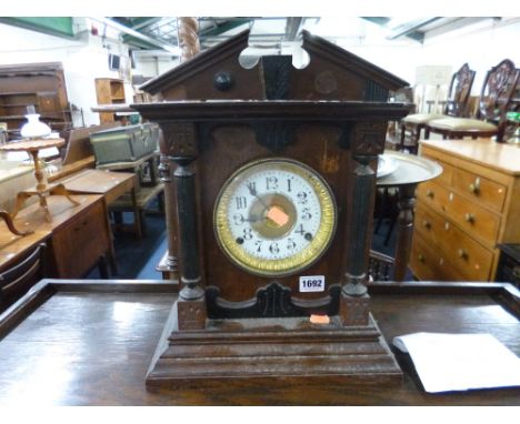 A LATE VICTORIAN OAK CASED BRACKET CLOCK, the enamel dial marked Fattorini and Sons, Bradford (s.d.) (key and pendulum)