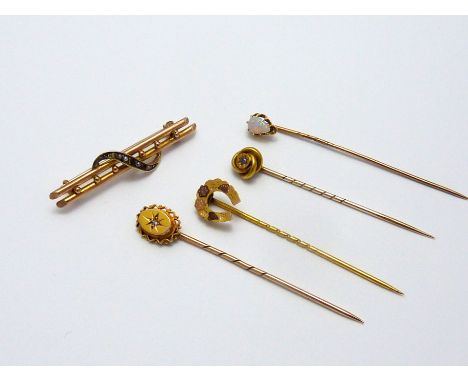 A COLLECTION OF STICK PINS, and a bar brooch, to include a diamond sapphire and opal stick pin with a further horseshoe stick