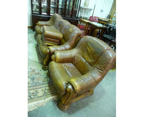 A LEATHER FOUR PIECE SUITE, with wooden frames and drawers, comprising of a two seater settee, pair of armchairs and a pouffe