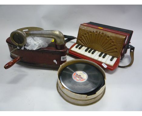 A GOLDENTONE TOY ACCORDION, plastic bodied with leather bellows, twenty key keyboard and eight buttons, together with a Bebip