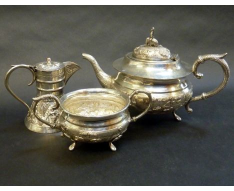 A WHITE METAL THREE PIECE TEA SERVICE, (3)
