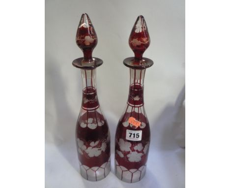 A PAIR OF LATE 19TH CENTURY RUBY WASH DECANTERS, decorated with grapes (2)