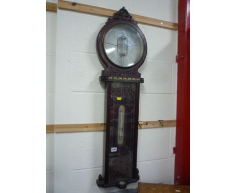 A VICTORIAN MAHOGANY AMERICAN FORECAST BAROMETER, by Joseph Davis & Co, 9 1/2 inch silvered dial with Winter and Summer displ