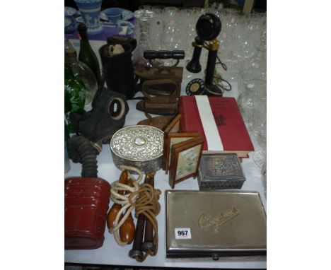 VARIOUS SUNDRY ITEMS, gas masks, reproduction candlestick telephone, cigar box, book etc