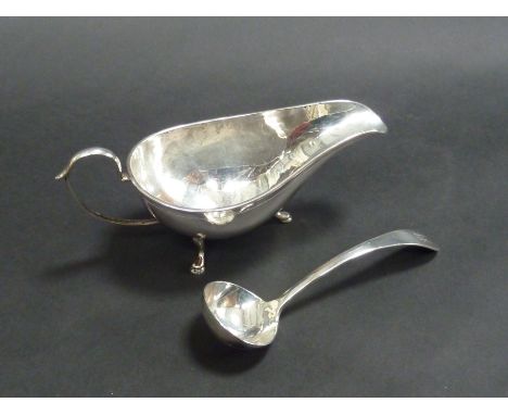 A CHINESE SILVER SAUCE BOAT AND LADLE, (2)