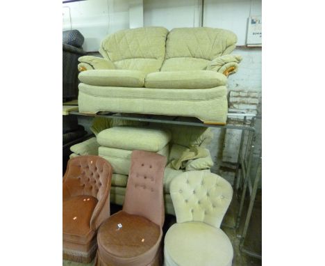 AN UPHOLSTERED THREE PIECE SUITE, comprising of two two seater settees and a pouffe