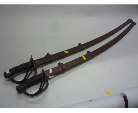 AN 1853 PATTERN CAVALRY SWORD, with 90cm fullered blade, standard guard and ribbed leather grip, in steel two-ring scabbard, 