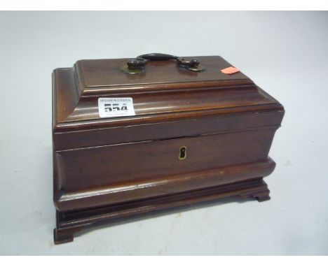 A MID VICTORIAN MAHOGANY TEA CADDY OR WORKBOX, of sarcophagus form with brass bale handle and bracket feet, the interior with