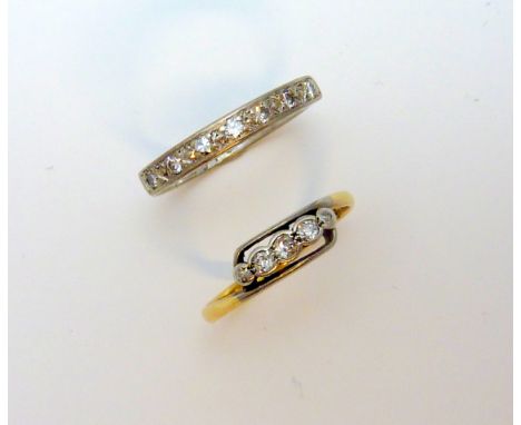 TWO RINGS, the first designed as five old cut diamonds in a graduated line, with another diamond band rind, estimated total d