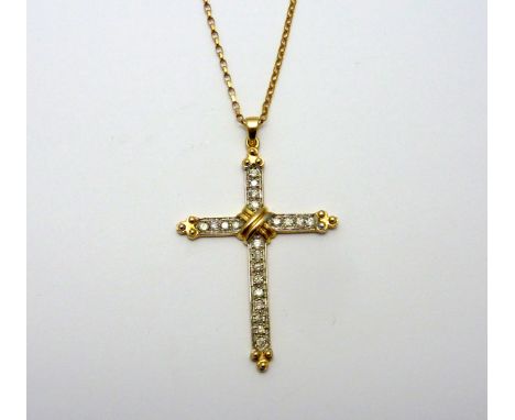 A 9CT GOLD DIAMOND CRUCIFIX PENDANT, of bi-colour design, estimated total diamond weight 0.40cts, hallmarks for Birmingham, l