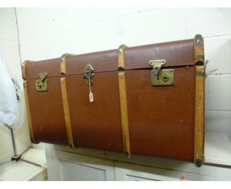 A LARGE TRAVELLING TRUNK