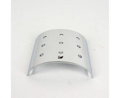 A chrome curve display stand for Swarovski 9 tulip flowers from 2002 to 2004. Gifted to Swarovski Collectors Society members.