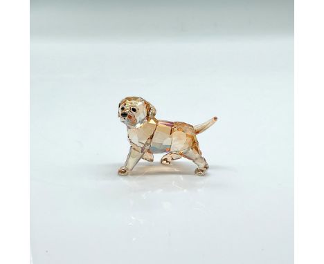 Brilliant faceted golden crystal figure of an alert standing puppy with black nose and eyes. Swarovski etched backstamp. This