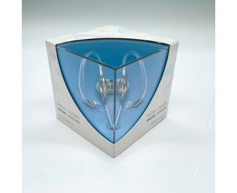 An unopened box of ear hook headphones by Philips with Swarovski crystals. This item has its original box: 3.75"L x 3.75"W x 