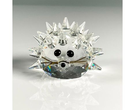 Multifaceted clear crystal with black eyes and nose and wire whiskers. This item has its original box, 3.75"H x 3.25"dia. Iss