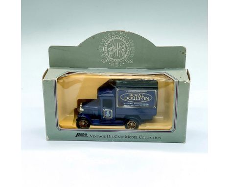 Advertising die-cast model truck; blue truck advertising Royal Doulton. In original packaging Issued: 20th centuryDimensions: