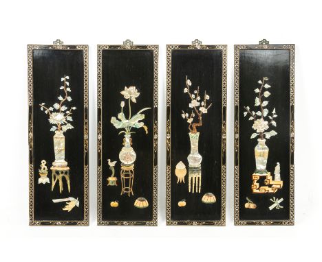 A SET OF FOUR MOTHER OF PEARL AND HARDSTONE INLAID PANELS
The design featuring the vases of lotus, chrysanthemums, plum bloss