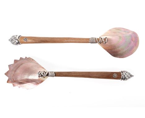 A PAIR OF SALAD SERVERS BY LOTUS ARTS DE VIVRE With wood handles, engraved white metal mounts and mother of pearl bowls, mark