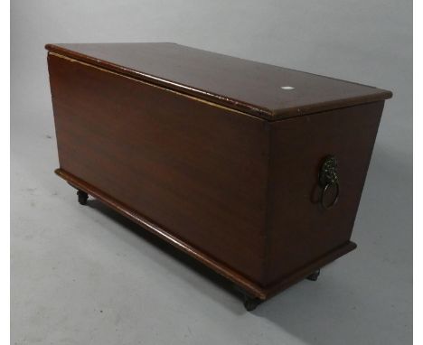 A Rectangular Mahogany Coal Box on Casters, Lion Mask Ring Handles (Hinged Lid Needs Attention), 63.5cms Wide with Metal Line