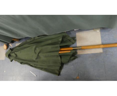 A Garden Parasol with Sliding Mechanism 