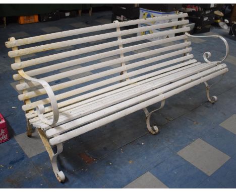 A White Painted Scroll Arm, Wrought Iron Garden Seat with Scrolled Supports, 185cms Wide 