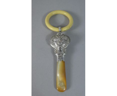 A Silver, Ivory and Mother of Pearl Handled Teething Ring and Rattle with Jack Horner Decoration, B'Ham 1915 by Aide &amp; Lo
