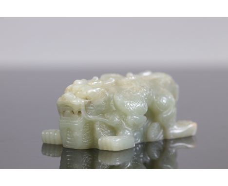 China - China seal, Qing dynasty, 18th century. Celadon nephrite square stamp surmounted by two crossed dragons. Missing the 