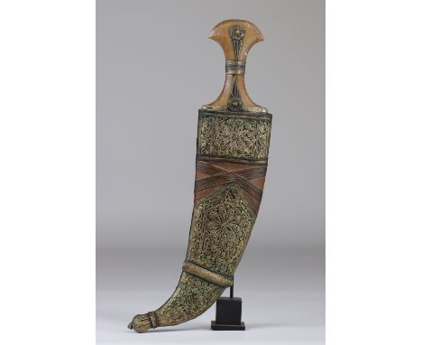 Dagger from Yemen called jambiya horn handle Blade engraved with a text: "Knowledge in the hands of the pupil, like the sword