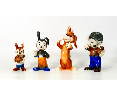 Four comical Goebel figures to include two rabbits, a squirrel and a hedghog with bee 