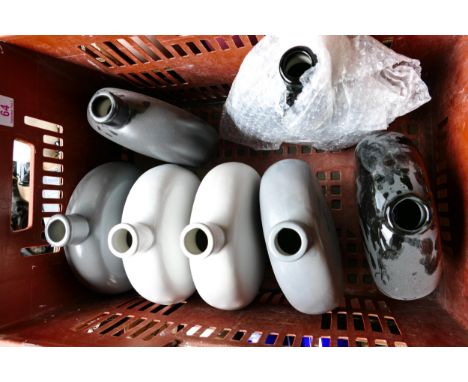 A collection of Wade Moon Flasks .These items were removed from the archives of the Wade factory and are possible prototypes 