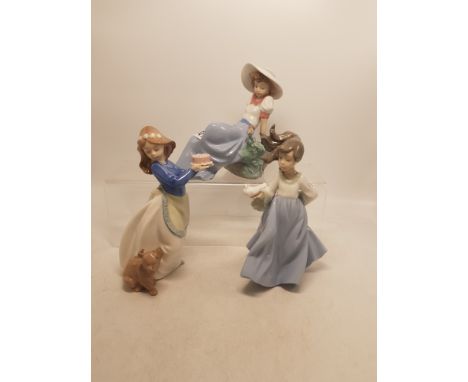 A group of 3 Lady Nao Figures 