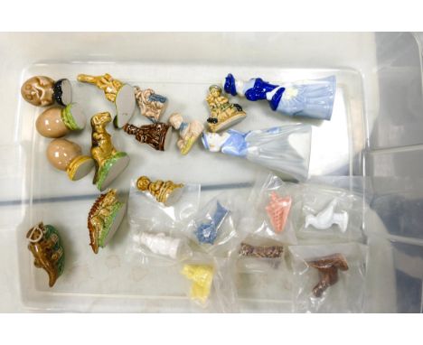 A collection of Wade whimeses together with two Wade lady figures to include dinosaurs, bean figures etc ( 1 tray) 